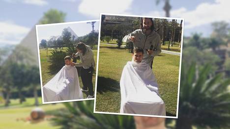 Silvio Heinevetter ist wohl der neue Friseur des DHB-Teams. Mit der Tape-Schere verpasst er Kollege David Schmidt bei der WM in Ägypten einen frischen Schnitt.