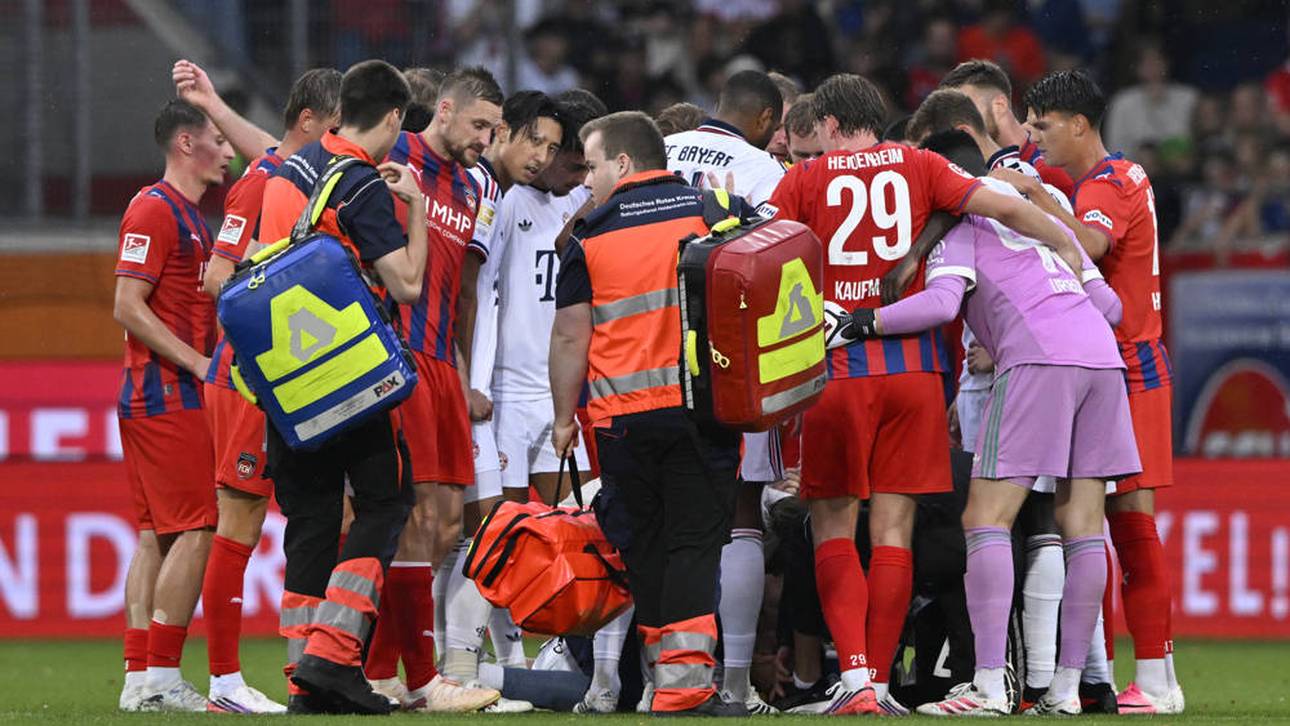 Die Sanitäter eilten auf den Platz und die Spieler bildeten einen Kreis um Musiala