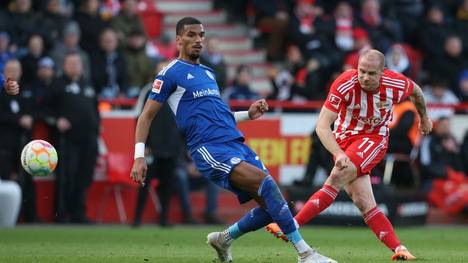 Moritz Jenz (l.) bleibt der Bundesliga erhalten