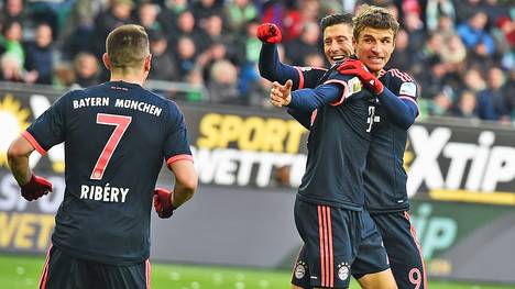 Franck Ribery, Robert Lewandowski und Thomas Müller jubeln