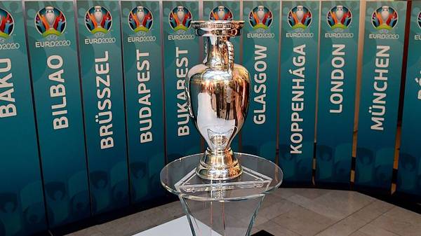 A model of the UEFA European football championship trophy is pictured surrounded with the names of host cities after an event to launch the Budapest's logo for the 2020 UEFA European Championship football tournament in Budapest on November 16, 2016.The EURO 2020 UEFA European Championship will see matches hosted in 13 cities across Europe, with the semi-finals and final staged at Wembley Stadium in London in July 2020. / AFP / ATTILA KISBENEDEK        (Photo credit should read ATTILA KISBENEDEK/AFP/Getty Images)