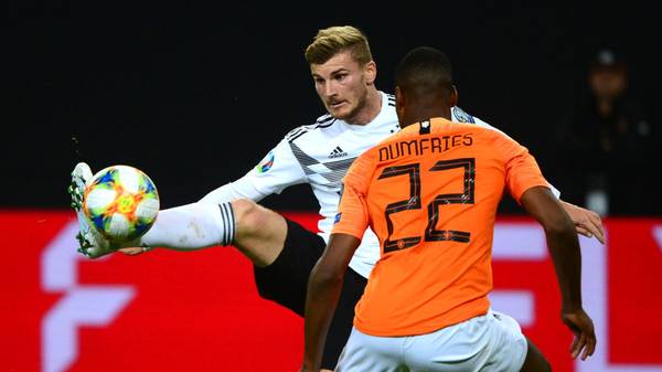 Germany's forward Timo Werner and Netherlands' Defender Denzel Dumfries vie for the ball during the UEFA Euro 2020 Group C qualification football match between Germany and the Netherlands in Hamburg, northern Germany, on September 6, 2019. (Photo by PATRIK STOLLARZ / AFP)        (Photo credit should read PATRIK STOLLARZ/AFP/Getty Images)