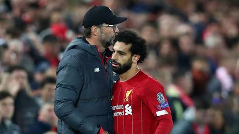 LIVERPOOL, ENGLAND - OCTOBER 02: Mohamed Salah of Liverpool embraces Jurgen Klopp, Manager of Liverpool after being substituted during the UEFA Champions League group E match between Liverpool FC and RB Salzburg at Anfield on October 02, 2019 in Liverpool, United Kingdom. (Photo by Clive Brunskill/Getty Images)