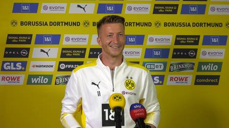 Erling Haaland fällt gerne mal durch seinen bunten Kleidungsstil auf. Teamkollege Marco Reus scherzt augenzwinkernd über die ungewöhnlichen Outfits des Norwegers.