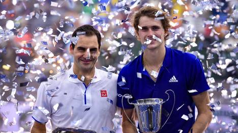 BUENOS AIRES, ARGENTINA - NOVEMBER 20: (L-R) Roger Federer of Switzerland and Alexander Zverev of Germany  pose with trophies after an exhibition game between Alexander Zverev and Roger Federer at Arena Parque Roca on November 20, 2019 in Buenos Aires, Argentina. (Photo by Marcelo Endelli/Getty Images)