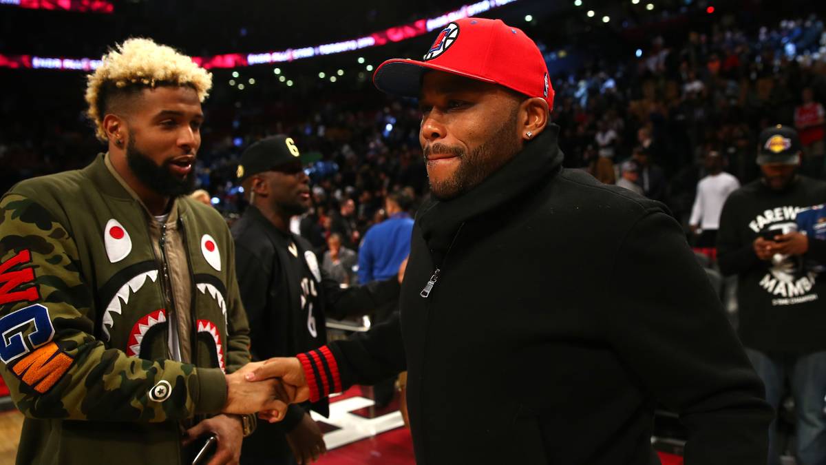 Mit Spektakel kennt sich auch NFL-Receiver Odell Beckham Jr. (l.) aus. Seine Fänge sind jetzt schon legendär. Schauspieler Anthony Anderson ist bei NBA-Spielen ein Dauergast