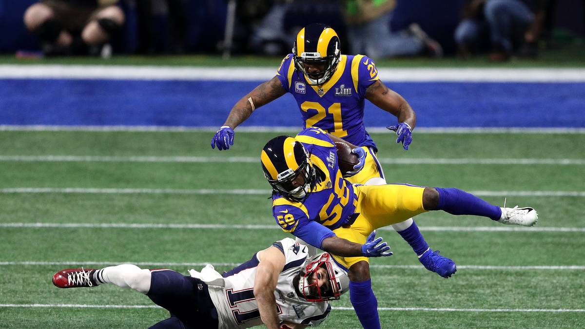 ... und bringt Littleton zu Fall, damit der den Ball nicht auch noch returnen kann