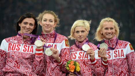 Russia's silver medalists Tatyana Firova