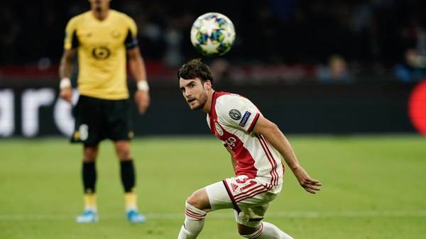 Ajax's Argentine defender Nicolas Tagliafico eyes the ball during the UEFA Champions league Group H football match between Ajax FC Amsterdam and LOSC Lille, at the Johan Cruijff Arena, in Amsterdam, on September 17, 2019. (Photo by Kenzo TRIBOUILLARD / AFP)        (Photo credit should read KENZO TRIBOUILLARD/AFP/Getty Images)