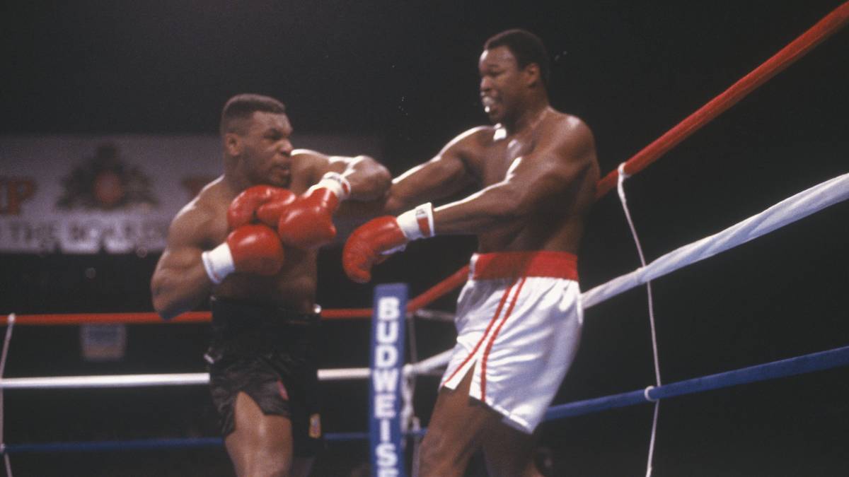 1988 kommt es zum Generationenduell: Der 38 Jahre alte ehemalige WBC- und IBF-Weltmeister Larry Holmes fordert den 21-jährigen Tyson heraus und attackiert ihn bereits vor dem Fight verbal. Doch der Weltmeister gibt die Antwort im Ring und beendet den Kampf bereits in der vierten Runde. Es ist die erste und einzige K.o.-Niederlage für Holmes