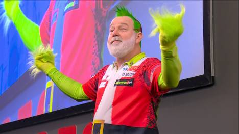 Peter Wright zeigt bei seinem Walk-On erneut eine Wahnsinns-Performance und zeigt sein neues Grinch-Kostüm. 