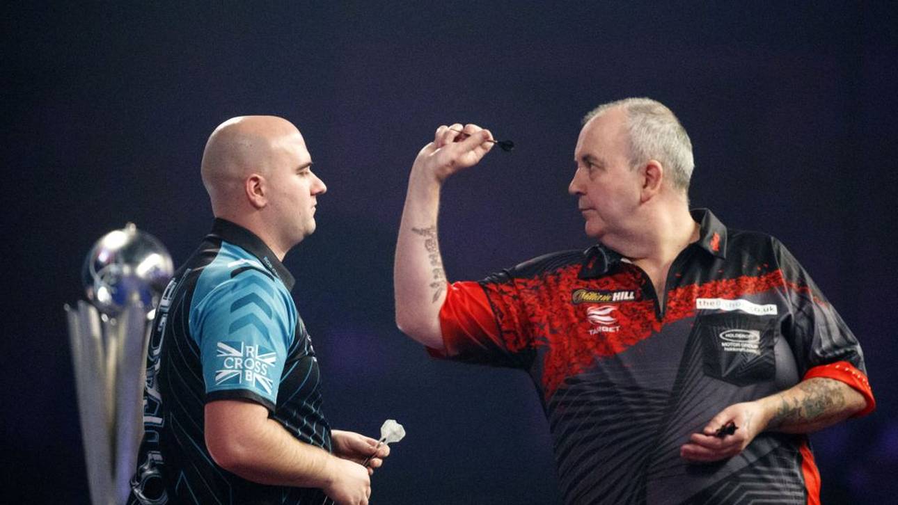 Ein erneuter WM-Triumph in seinem letzten Karrierespiel war Taylor nicht mehr gegönnt. Gegen Rob Cross (l.) verabschiedete er sich mit einer 2:7-Niederlage von der großen Bühne