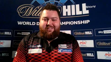 Michael Smith steht zum zweiten Mal in seiner Karriere im Darts-WM Endspiel. Nun will er den Titel - und muss dann seine Frau von einem neuen "Haustier" überzeugen...