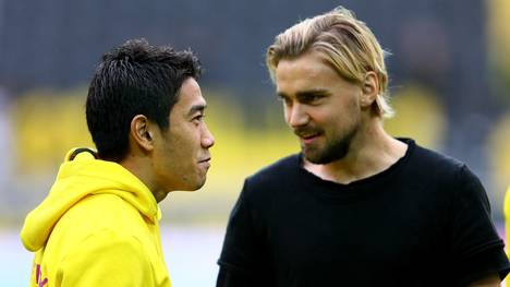 Shinji Kagawa (links) und Marcel Schmelzer bangen um ihren Einsatz beim BVB