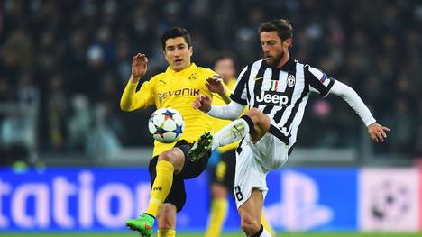 So war es im Hinspiel: Nuri Sahin von Borussia Dortmund duelliert sich mit  Claudio Marchisio (Juventus Turin)