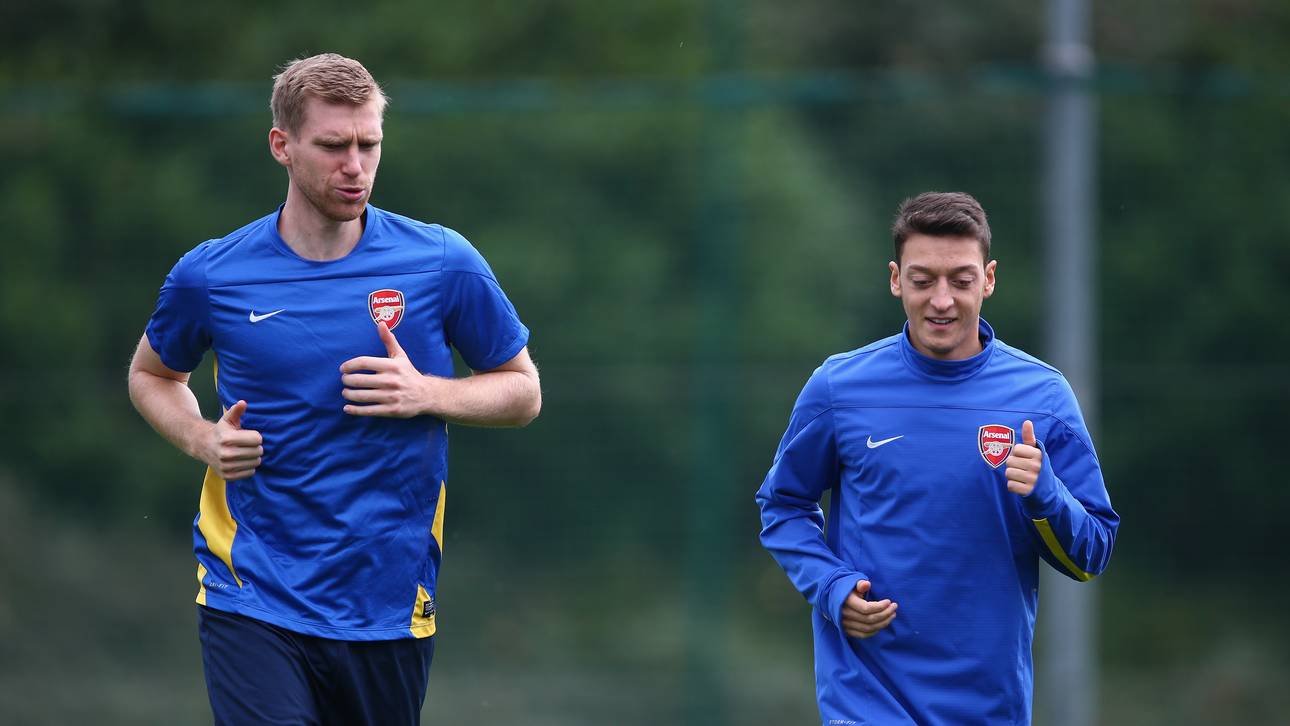 Per Mertesacker und Mesut Özil waren sowohl beim FC Arsenal als auch in der Nationalmannschaft Teamkollegen