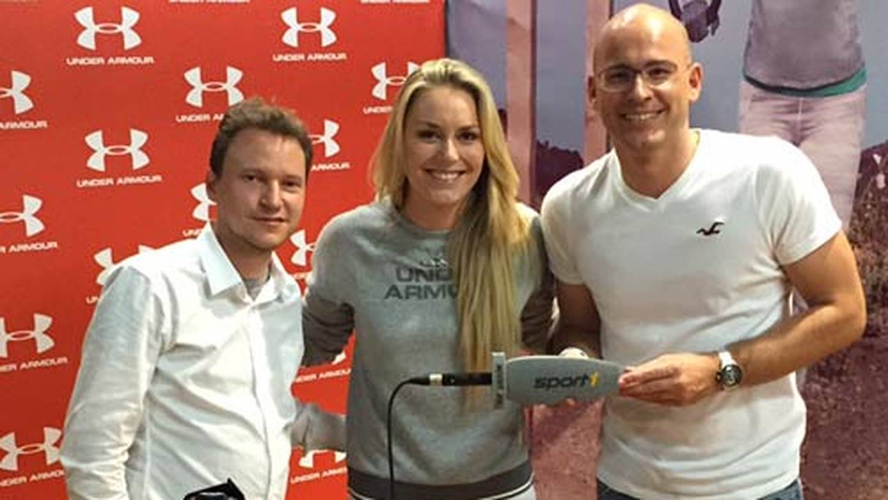 Lindsey Vonn (M.) mit den SPORT1-Redakteuren Andreas Kloo und Michael Gößl