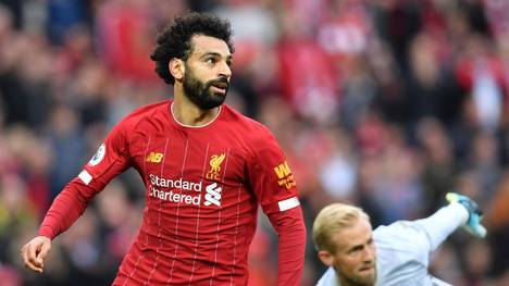 Liverpool's Egyptian midfielder Mohamed Salah in action during the English Premier League football match between Liverpool and Leicester City at Anfield in Liverpool, north west England on October 5, 2019. (Photo by Paul ELLIS / AFP) / RESTRICTED TO EDITORIAL USE. No use with unauthorized audio, video, data, fixture lists, club/league logos or 'live' services. Online in-match use limited to 120 images. An additional 40 images may be used in extra time. No video emulation. Social media in-match use limited to 120 images. An additional 40 images may be used in extra time. No use in betting publications, games or single club/league/player publications. /  (Photo by PAUL ELLIS/AFP via Getty Images)
