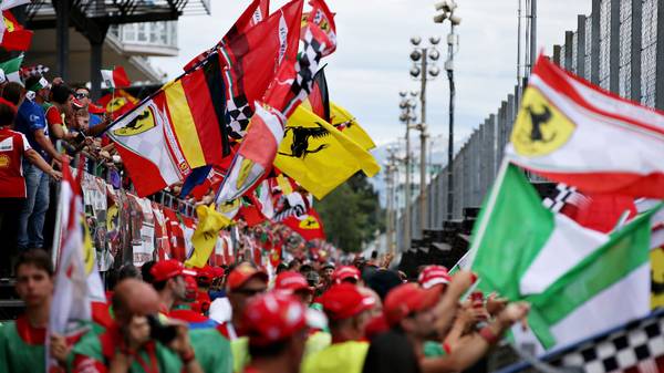 MONZA, ITALY - SEPTEMBER 08: Ferrari fans wave flags to show their support before the F1 Grand Prix of Italy at Autodromo di Monza on September 08, 2019 in Monza, Italy. (Photo by Charles Coates/Getty Images)
