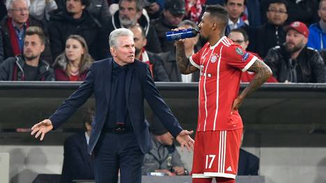 Jupp Heynckes (l.) und Jerome Boateng peilen mit dem FC Bayern das Triple an