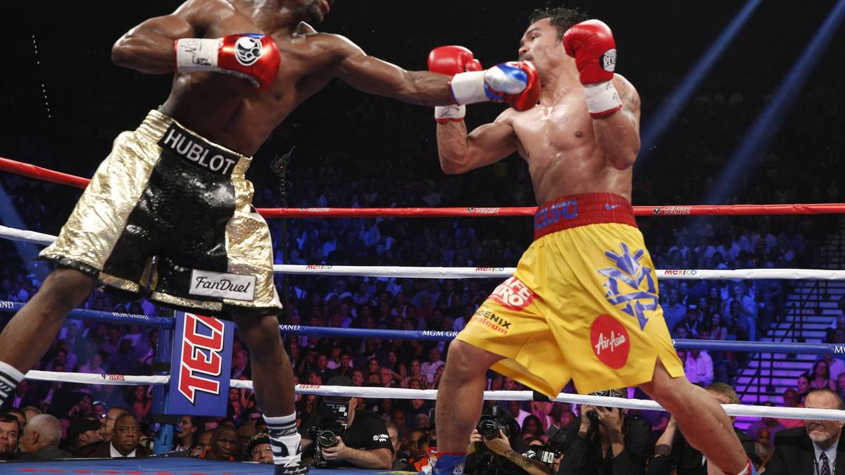 MAYWEATHER VS. PACQUIAO: Der US-Amerikaner Floyd Mayweather und der Philippiner Manny Pacquiao, die beiden wohl besten Boxer der jüngeren Vergangenheit, messen sich am 2. Mai 2015 in einem großen WM-Vereinigungskampf (WBA, WBC und WBO) in Las Vegas. In dem als "Jahrhundertkampf" angepriesenen Duell setzt sich Mayweather nach Punkten durch. Der Fight soll 400 Millionen Dollar generiert haben