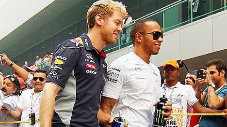 Lewis Hamilton debüttierte genau wie Vettel (im Vordergrund) 2007 in der Formel 1