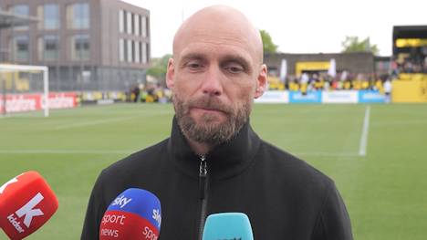 Am Rande des BVB-Trainings spricht Sportdirektor Nils-Ole Book über den kommenden Dortmunder Transfersommer. Dabei fallen mehrere Namen, die im Sommer heißer werden könnten.
