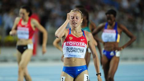 Russia's Yuliya Rusanova reacts after co