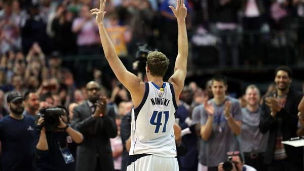 DALLAS, TX - MARCH 07:  Dirk Nowitzki #41 of the Dallas Mavericks celebrates after scoring his 30,000 career point in the second quarter against the Los Angeles Lakers at American Airlines Center on March 7, 2017 in Dallas, Texas.  NOTE TO USER: User expressly acknowledges and agrees that, by downloading and/or using this photograph, user is consenting to the terms and conditions of the Getty Images License Agreement.  (Photo by Ronald Martinez/Getty Images)