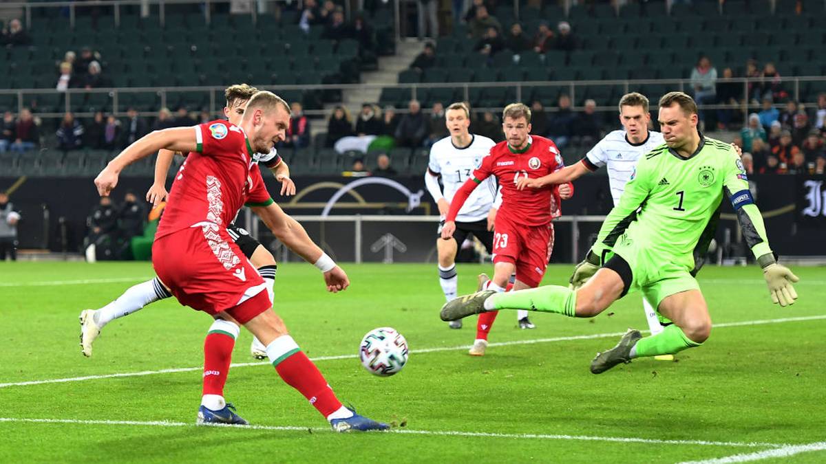 MOENCHENGLADBACH, GERMANY - NOVEMBER 16: Denis Laptev of Belarus shoots but the shot is saved by Manuel Neuer of Germany during the UEFA Euro 2020 Group C Qualifier match between Germany and Belarus on November 16, 2019 in Moenchengladbach, Germany. (Photo by Jörg Schüler/Bongarts/Getty Images)