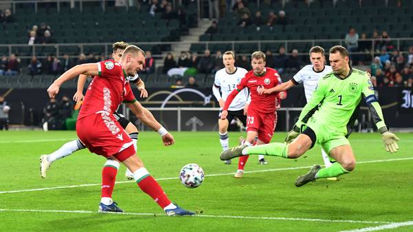 MOENCHENGLADBACH, GERMANY - NOVEMBER 16: Denis Laptev of Belarus shoots but the shot is saved by Manuel Neuer of Germany during the UEFA Euro 2020 Group C Qualifier match between Germany and Belarus on November 16, 2019 in Moenchengladbach, Germany. (Photo by Jörg Schüler/Bongarts/Getty Images)