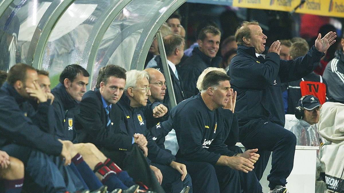 Manager Berti Vogts of Scotland shouts orders from the dugout