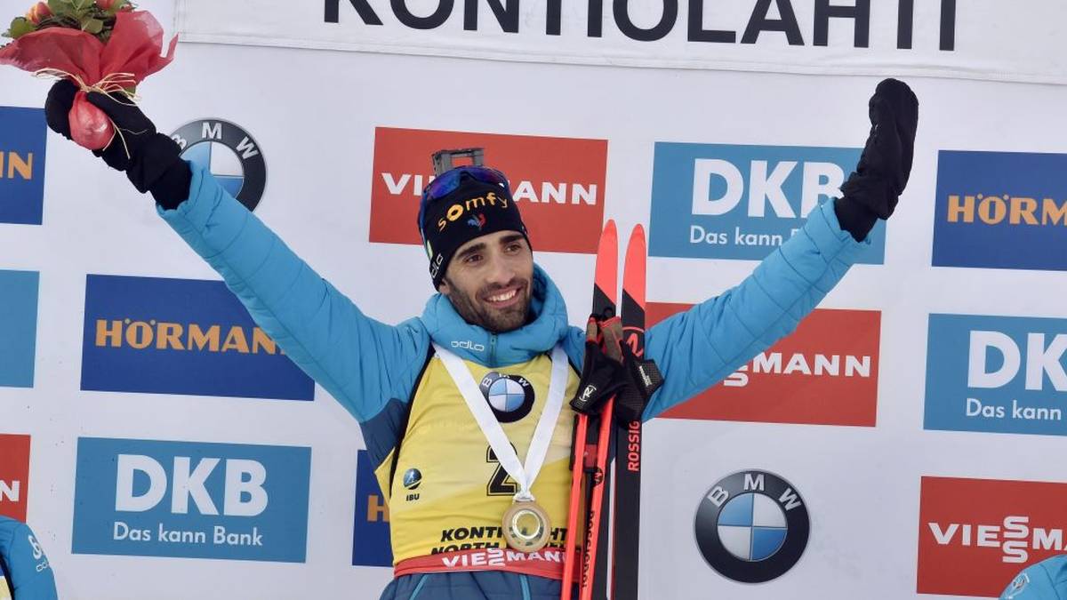 winner Martin Fourcade of France celebrates on the podium after the men's 12,5 km Pursuit competition at the IBU Biathlon World Cup in Kontiolahti, Finland, on March 14, 2020. - Fourcade ends his career now at the end of the season in Kontiolahti where he took his first World Cup victory exactly 10 years ago on March 14, 2010. (Photo by Jussi Nukari / Lehtikuva / AFP) / Finland OUT (Photo by JUSSI NUKARI/Lehtikuva/AFP via Getty Images)