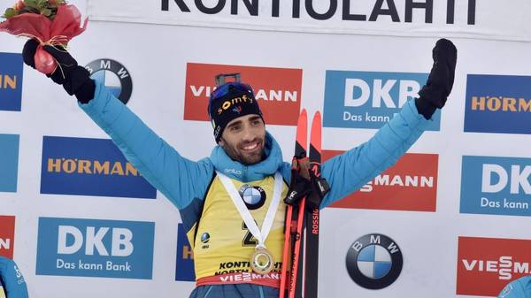 winner Martin Fourcade of France celebrates on the podium after the men's 12,5 km Pursuit competition at the IBU Biathlon World Cup in Kontiolahti, Finland, on March 14, 2020. - Fourcade ends his career now at the end of the season in Kontiolahti where he took his first World Cup victory exactly 10 years ago on March 14, 2010. (Photo by Jussi Nukari / Lehtikuva / AFP) / Finland OUT (Photo by JUSSI NUKARI/Lehtikuva/AFP via Getty Images)