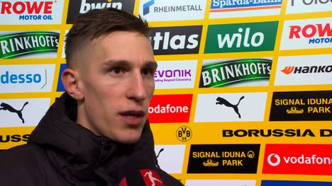 Nico Schlotterbeck hätte nach dem Foul an Josip Stanisic auch Rot sehen können, das weiß der Verteidiger auch. 