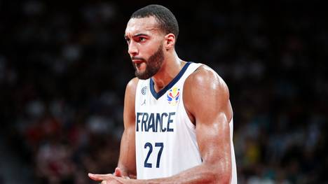 SHENZHEN, CHINA - SEPTEMBER 01: #27 Rudy Gobert of the France National Team reacts against the Germany National Team during the 1st round of 2019 FIBA World Cup at Shenzhen Bay Sports Center on September 01, 2019 in Shenzhen, China. (Photo by Zhong Zhi/Getty Images)