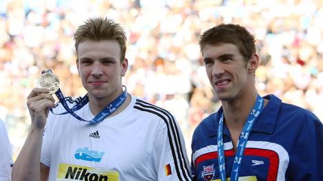 Schwimmen: Paul Biedermann kann sich nicht an seine WM-Siege erinnern, Paul Biedermann (links) gewann 2009 WM-Gold über 200m Freistil vor Michael Phelps