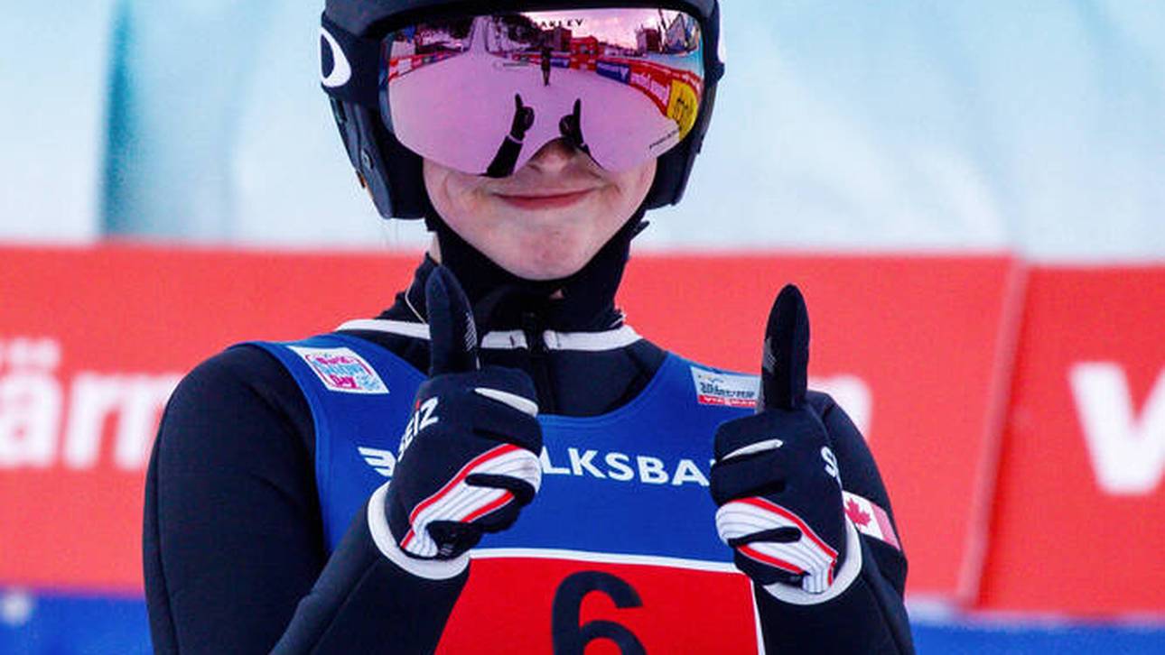 Skispringerin schreibt Geschichte