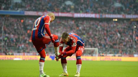Arjen Robben (l.) erzielt gegen den Hamburger SV seine Saisontore 13 und 14