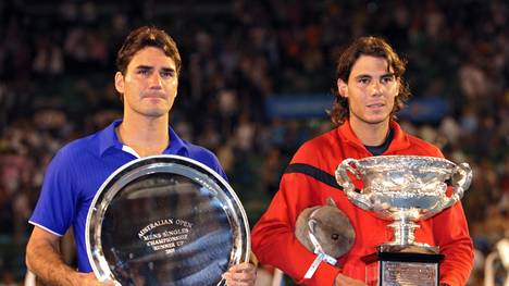 Rafael Nadal (R) of Spain and Roger Fede