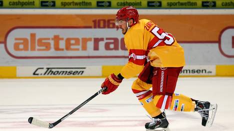 HAMBURG, GERMANY - SEPTEMBER 20: Marc Zanetti of Duesseldorf skats up the ice against the Hamburg Freezers during the DEL game between Hamburg Freezers and Duesseldorfer EG at O2 World on September 20, 2013 in Hamburg, Germany.  (Photo by Martin Rose/Bongarts/Getty Images)