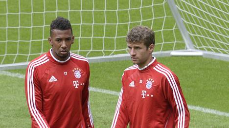 Thomas Müller (r.) und Jerome Boateng spielen gemeinsam für den FC Bayern