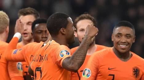 Netherlands' midfielder Georginio Wijnaldum celebrates with teammates after scoring a goal during the Euro 2020 football qualification match between Belarus and the Netherlands in Minsk on October 13, 2019. (Photo by Sergei GAPON / AFP) (Photo by SERGEI GAPON/AFP via Getty Images)