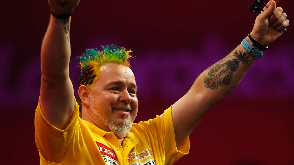 Der Irokese wird auch gern mal zum Regenbogen umfunktioniert und harmoniert so noch besser mit dem sonnengelben Shirt