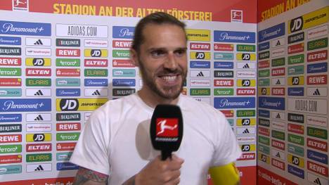 Christopher Trimmel feiert mit Union Berlin den Klassenerhalt - und muss selbst über die abgelaufene Saison schmunzeln. 