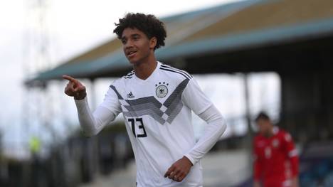 GREENOCK, SCOTLAND - OCTOBER 12: Kevin Schade of Germany celebrates scoring his team's third goal and completes his hat trick during the UEFA Under 19 European qualifier match between Belarus and Germany at Cappielow Park on October 12, 2019 in Greenock, Scotland. (Photo by Ian MacNicol/Getty Images for DFB)