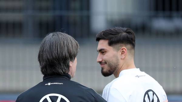 DORTMUND, GERMANY - OCTOBER 07: (L-R) Head coach Joachim Loew talks to Suat Serdar of Germany during a training session at BVB-Trainingsgelaende on October 07, 2019 in Dortmund, Germany. Germany will play against Argentina in an international friendly match on October 9, 2019 in Dortmund. (Photo by Christof Koepsel/Bongarts/Getty Images)