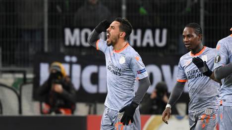 Basaksehir's Irfan Can Kahveci celebrate after he scored a goal during the UEFA Europa League Group J football match Borussia Moenchengladbach v Istanbul Basaksehir FK in Moenchengladbach, western Germany, on December 12, 2019. (Photo by INA FASSBENDER / AFP) (Photo by INA FASSBENDER/AFP via Getty Images)