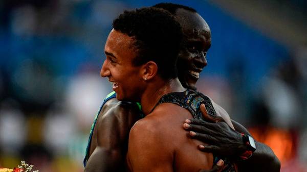 USA's Donovan Brazier (R) embraces Kenya's Ferguson Rotich after winning the Men's 800m during the IAAF Diamond League competition on June 6, 2019 at the Olympic stadium in Rome. (Photo by Filippo MONTEFORTE / AFP)        (Photo credit should read FILIPPO MONTEFORTE/AFP/Getty Images)