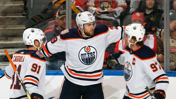 SUNRISE, FL - NOVEMBER 8: Leon Draisaitl #29 celebrates his goal with Drake Caggiula #91 and Connor McDavid #97 of the Edmonton Oilers against the Florida Panthers at the BB&T Center on November 8, 2018 in Sunrise, Florida. The Panthers defeated the Oilers 4-1. (Photo by Joel Auerbach/Getty Images)